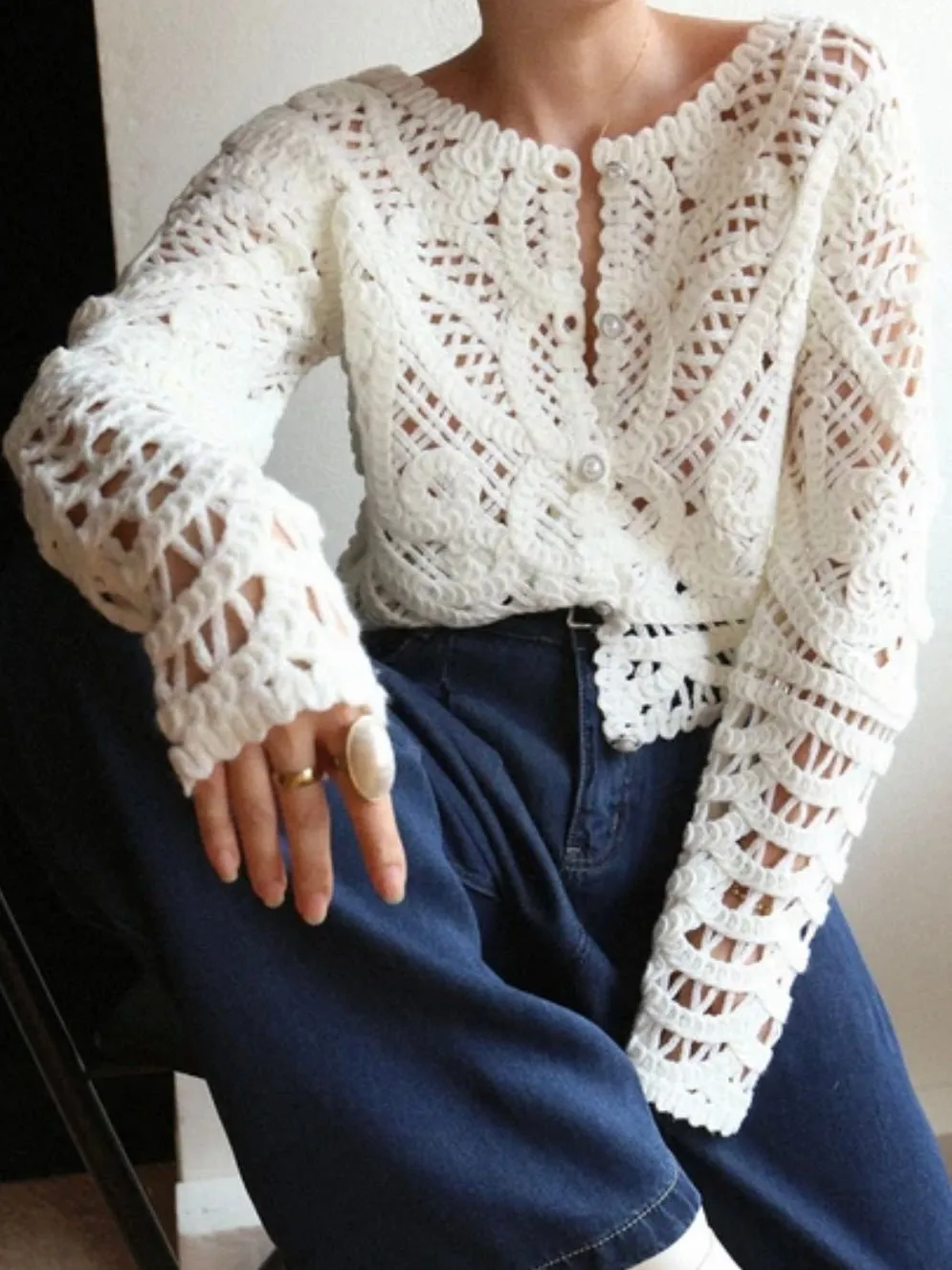 White knitted sweater