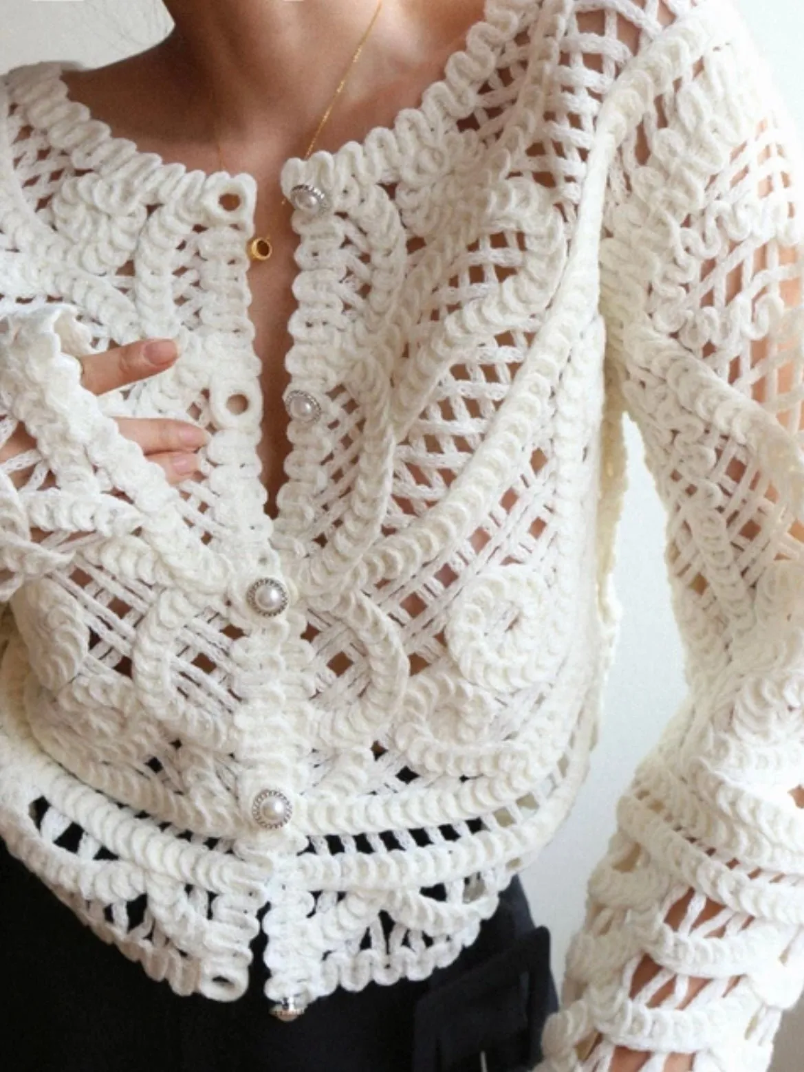 White knitted sweater