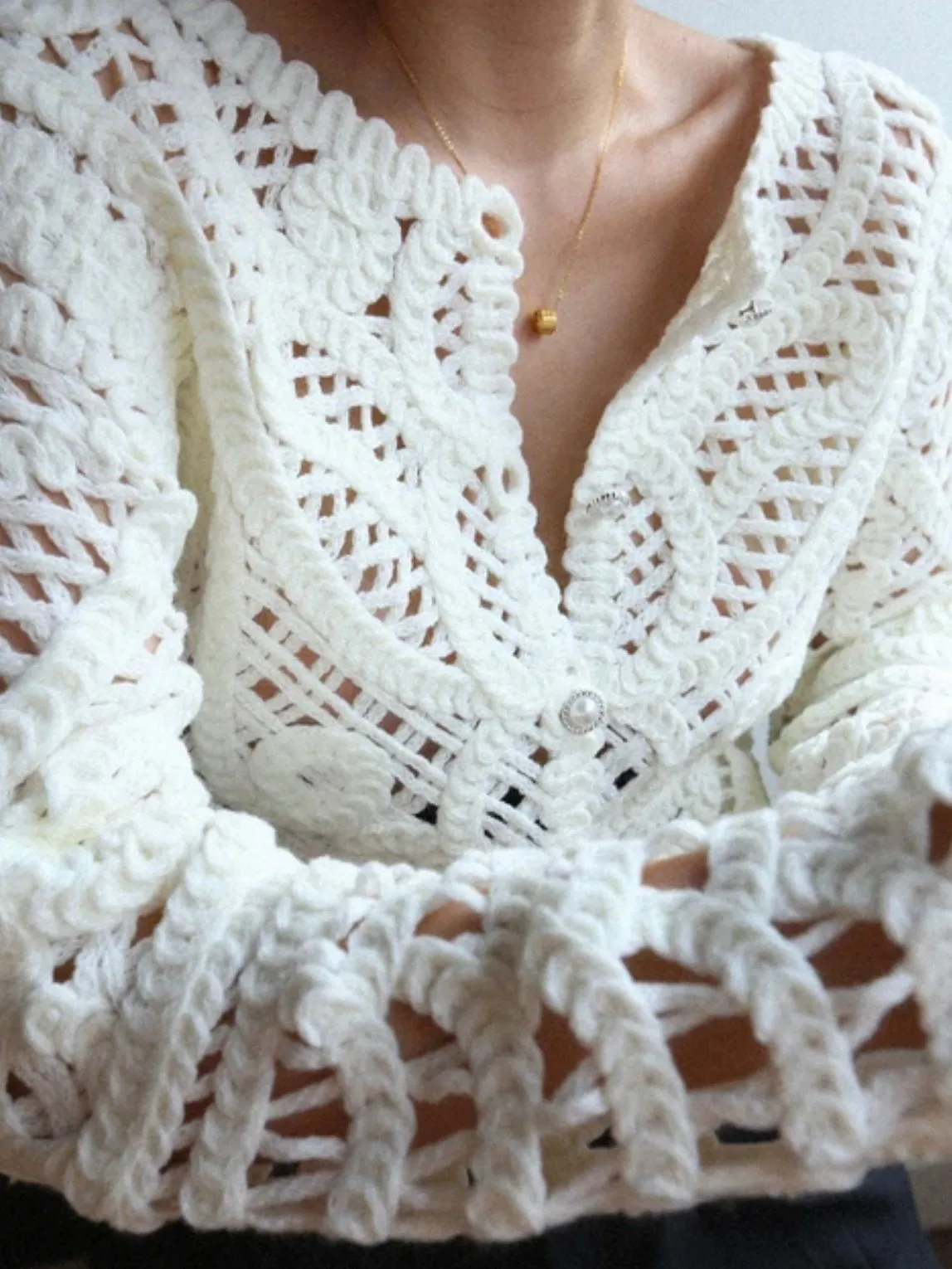 White knitted sweater